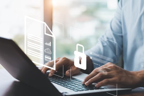 male hands at keyboard with lock icon