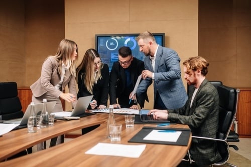 employees meeting at a conference table
