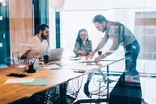 group of people around a conference table