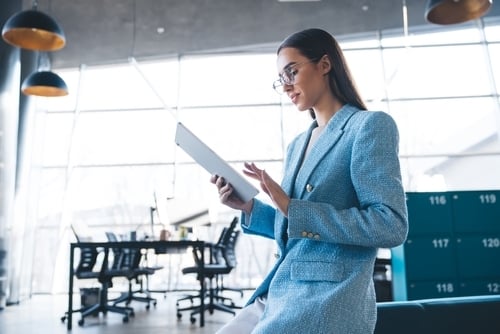 business woman looking at device