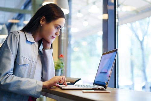 women looking at laptop screen