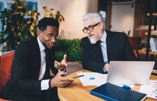 diverse male colleagues at office
